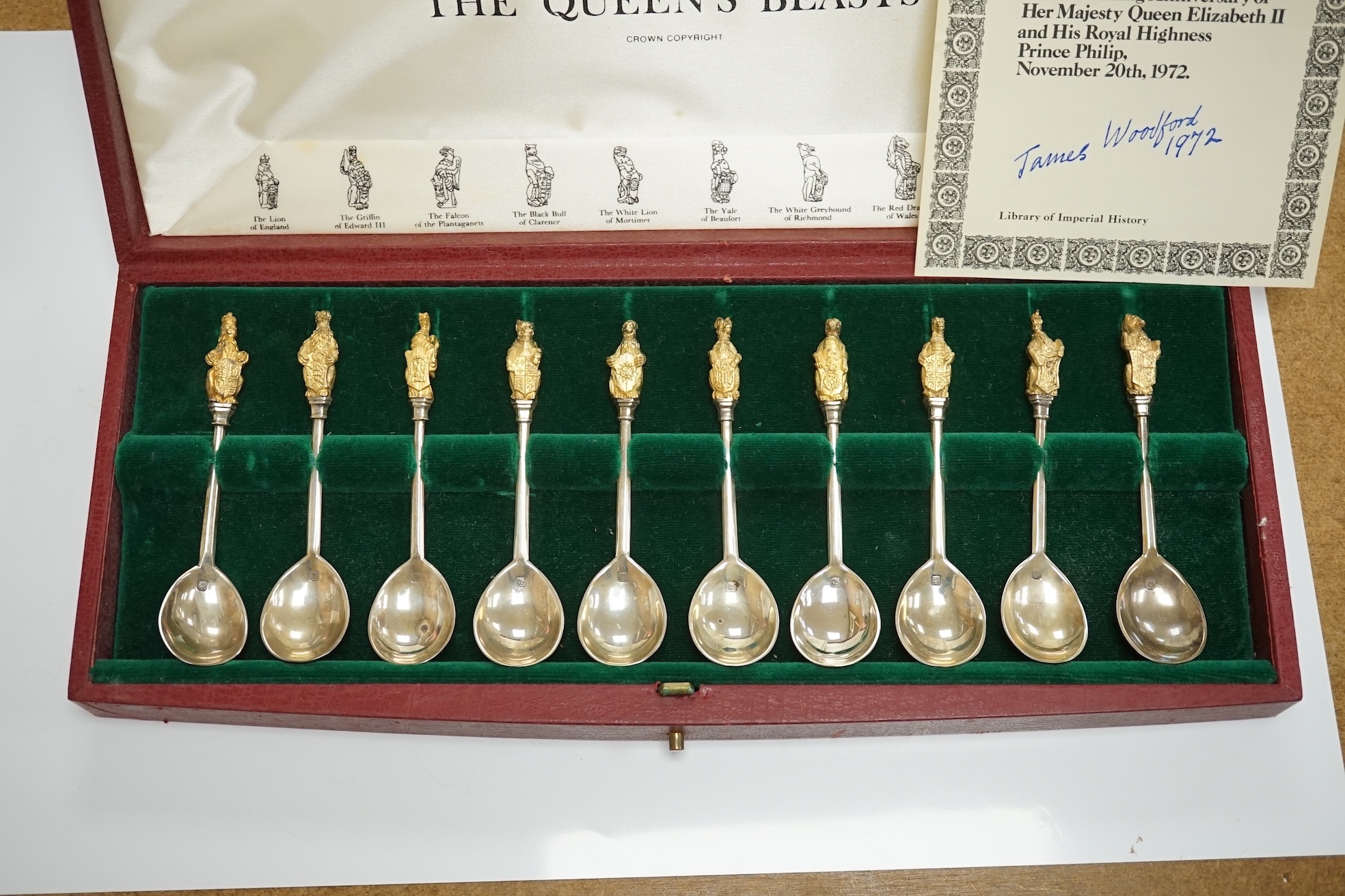 A cased set of ten parcel gilt silver 'The Queens Beasts' Elizabeth II Silver Wedding Anniversary commemorative spoons, William Comyns & Sons Ltd, London, 1972, 11.6cm. Condition - fair to good